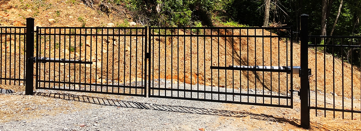 4' x 16' dual flat top ornamental steel drive gate.