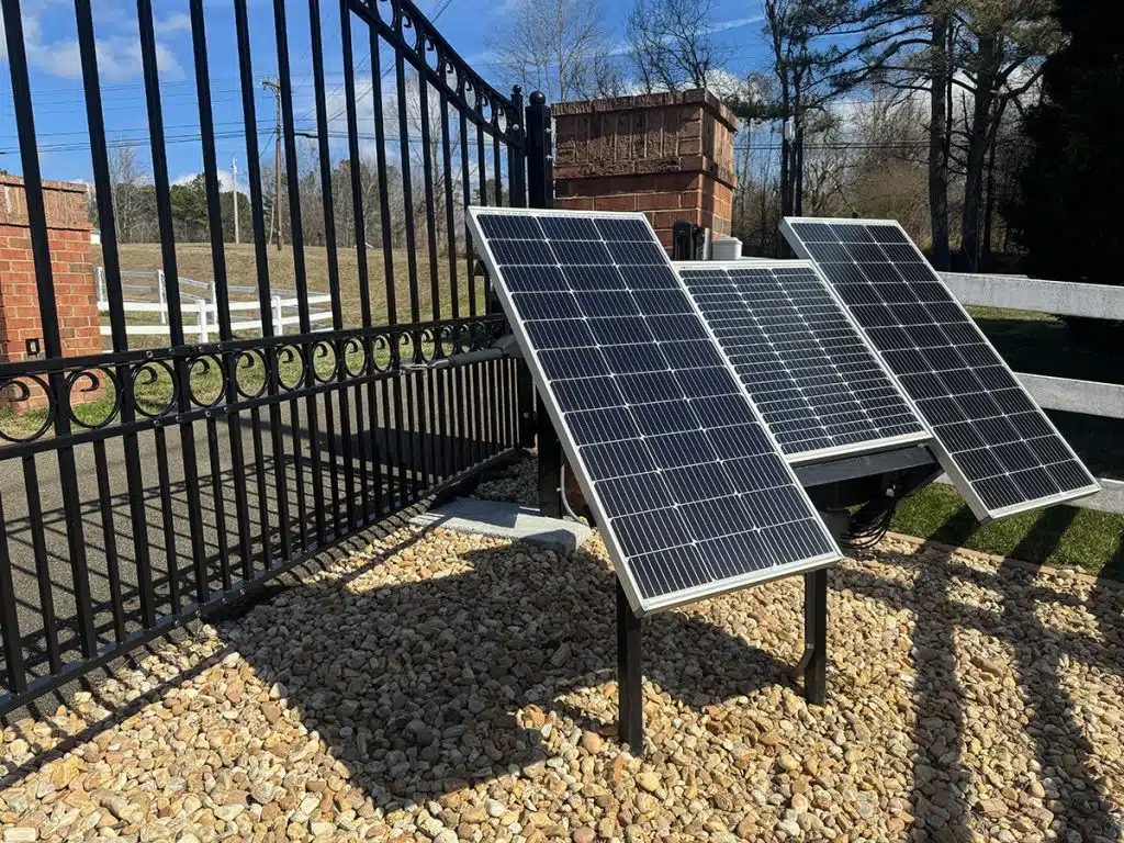 Solar-powered-driveway-gate-opener-installation - North Georgia Fence Co. Solar-powered automatic gate opener installation in Jasper, GA
