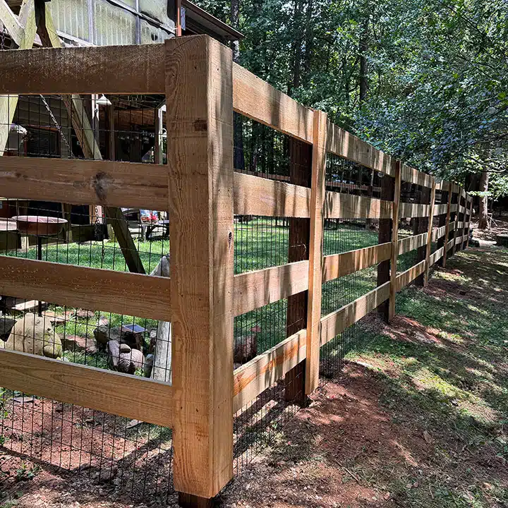 Custom-5-foot-horizontal-4-board-wood-fence-installed-in-Ellijay-GA